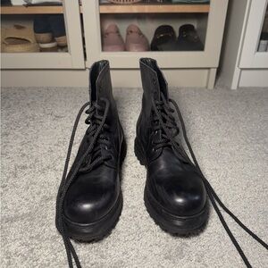 Black leather boots form Italy